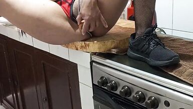 Watch La Ross pleasure herself in the kitchen while cooking dinner