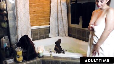 Watch Mindi Mink get naughty as she rubs her clit while getting a hot bath - 4 image