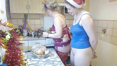 Konstanzia and her young friend share a steamy kitchen kiss & pussy play - 15 image