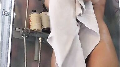 Angelina Love rubs her wet pussy in the shower until she cums hard