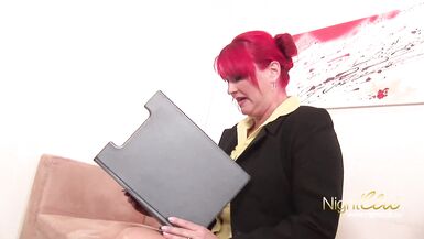 Watch this busty redhead MILF bangs a small-titted bumbie with her massive tits - 2 image
