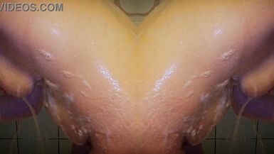 Mrs. Gingerbread sensually massages herself in the shower and shows off her erotic body