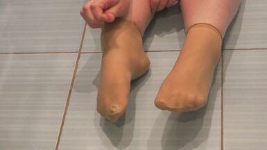 Big Pussy offers you to lick her holes and pee while wearing nylon socks