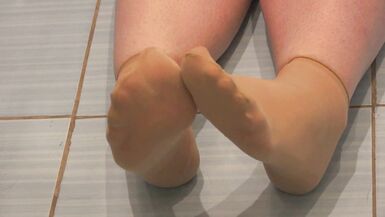 Big Pussy offers you to lick her holes and pee while wearing nylon socks