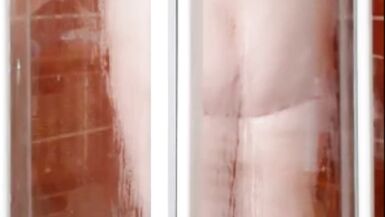 SexyLishia, the MILF beauty, enjoys a steamy outdoor shower with her massive tits and handsfree skills