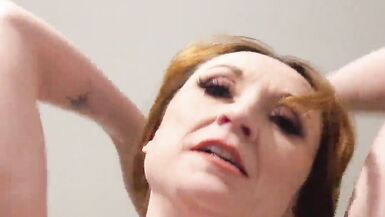 Lily Kink is a dirty-talking MILF who loves to see youstrip and fuck her way to orgasm