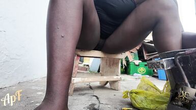 Bibi 58 flaunts her pussy while preparing a meal for her hubby in the open air