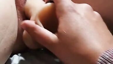 Hubby Filling Pussy with Dildo while he's Caged - 5 image