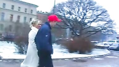 Hot mature woman in stockings and a young courier - 1 image