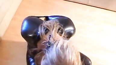 Blonde Beauty in Latex catsuit tied with Tape and Ballgaged