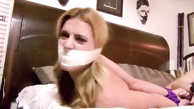 2 hot Women fastened and gagged bare on sofa and struggles - 9 image