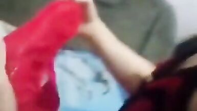 Vika in red shorts bonks her spouse on a smartphone - 4 image