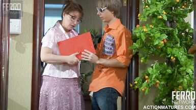 A Youthful Russian Guy and Aged Russian Woman - 1 image