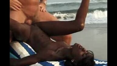 Sexy chokolate on the beach - 1 image