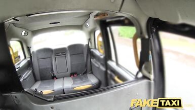 Fake Taxi Sexy estate agent receives creampied - 1 image