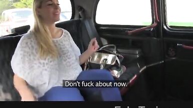 Hot blonde on taxi bonnet