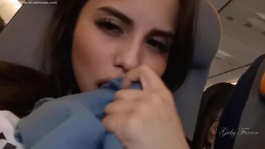Hot Latina plays with Pussy and Big Tits in Public Plane - 1 image