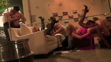 Stunning girls fuck some horny dudes during an orgy - 1 image