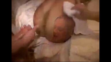 Awesome cumshot right in the eye of a gorgeous MILF - 1 image