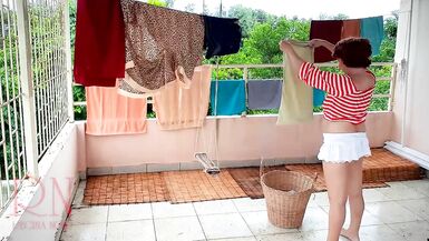 Naked Laundry. the Maid is Drying Clothes in the Laundry.