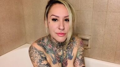 Goth Girl Samantha James makes a Splash with Realistic Cock - 1 image