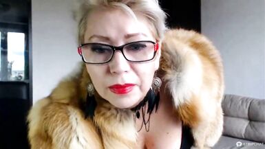 Hot sexy Russian MILF slut in a fur coat and a cigarette...