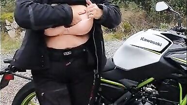 Milf flashing tits outdoor and do a hand job on hers hubby. - 3 image