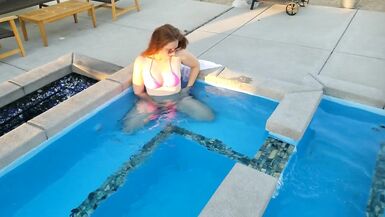 Sexy Nymph in Pink Bikini Plays in the Pool - 2 image