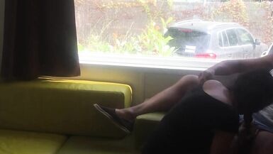Wife giving risky blowjob in front of window in a camping - 8 image