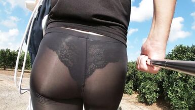 Whatch this Laidy's Thong thru Leggings as she Walks - 5 image