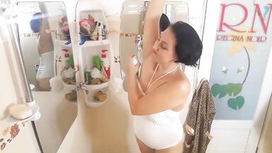 Lady shaves her armpits  shower room, lathers her body 1-3