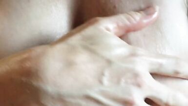 MILF Rubbing Cock on Oily Breasts - 9 image