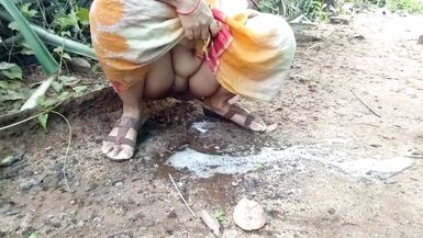 Desi Indian Aunt Outdoor Public Pissing Video Compilation - 14 image