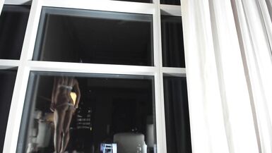Muscular MILF Panties try on Haul in Front of Window - 2 image